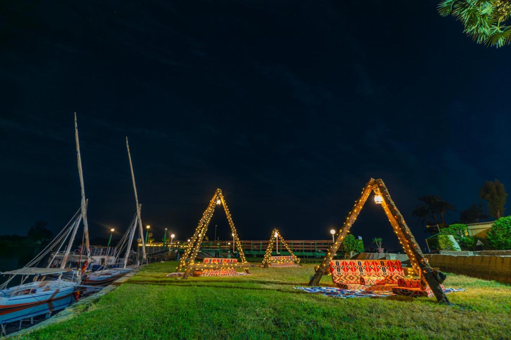 Jolie Ville Hotel & Spa Kings Island Луксор Экстерьер фото The bridge at night
