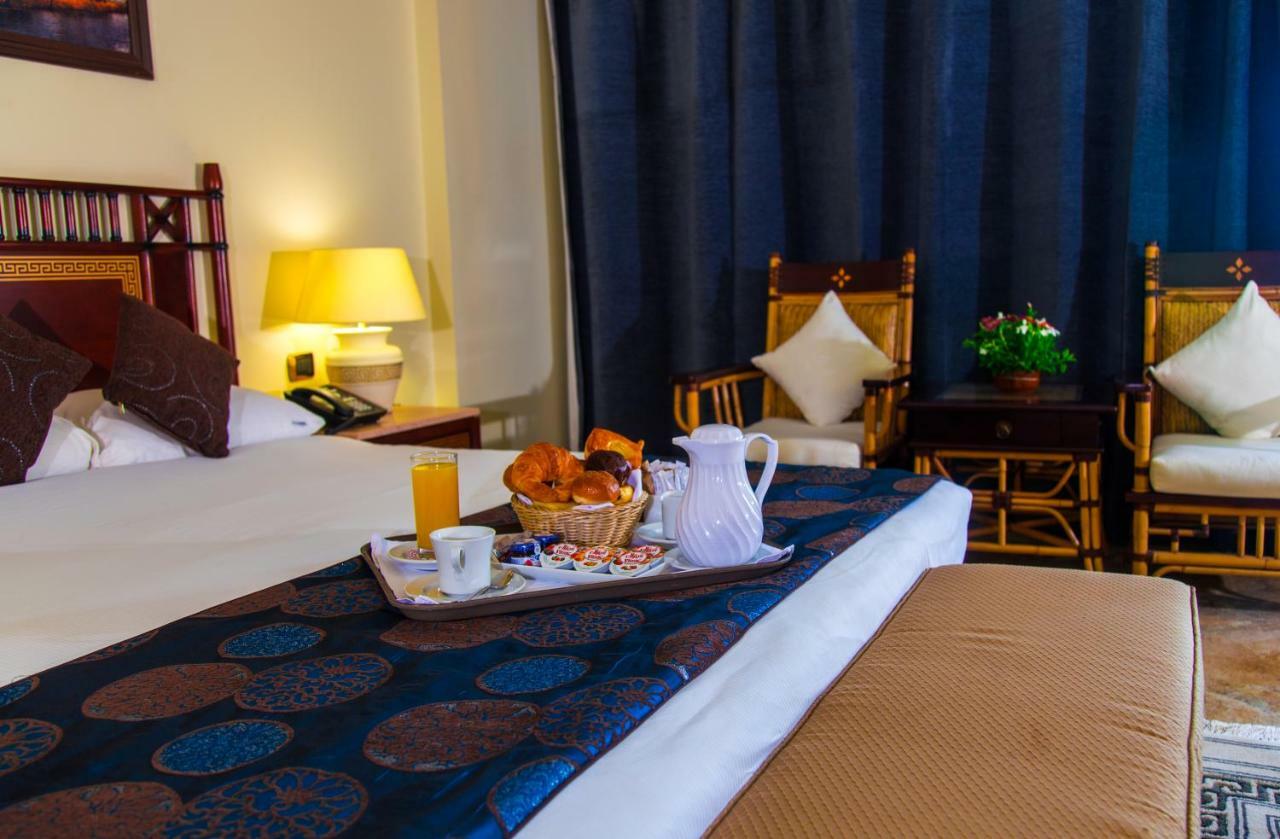 Jolie Ville Hotel & Spa Kings Island Луксор Экстерьер фото A room at the Nile Hilton